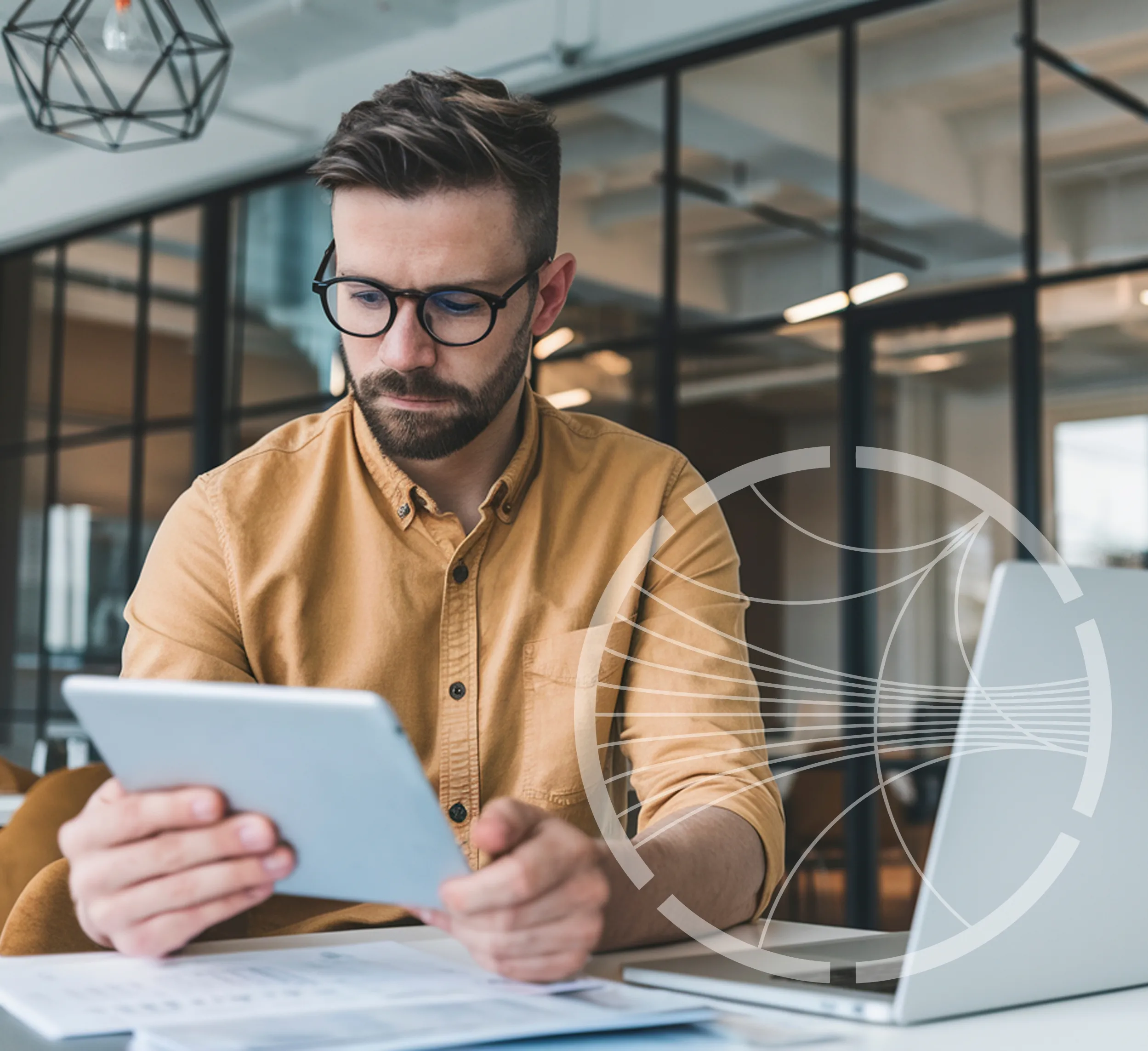 man looking at tablet